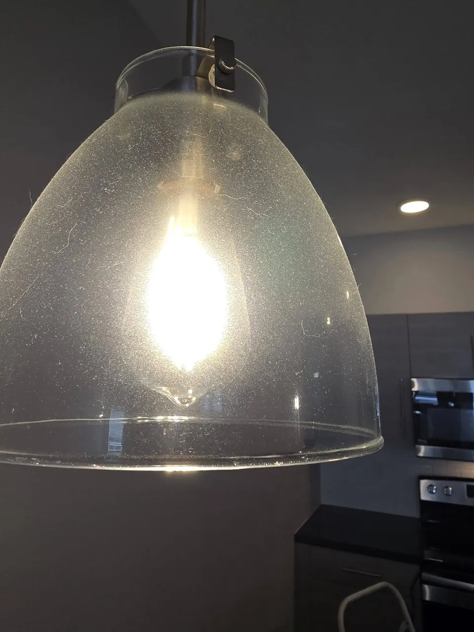 Before: speckled, dirty pendant light
